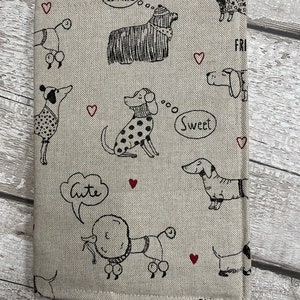Printed dog design , removable  A5 notebook cover. Linen fabric cover with printed cartoon dogs on the front...Pawfect for a dog lover
