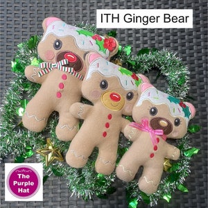 May include: Three gingerbread bear plush toys with embroidered details, including icing, sprinkles, and holly. The bears are arranged in a circle on a green and silver garland.