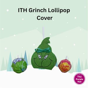 May include: A green felt ITH Grinch Lollipop Cover featuring an embroidered face and a small green ribbon bow, positioned between a green Fizz Pop lollipop and a red Chupa Chups lollipop. The text ITH Grinch Lollipop Cover is visible.