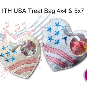 May include: Two heart-shaped treat bags with an American flag design. The bags are made of white felt with red and blue embroidery. The bags are 4x4 and 5x7 inches.