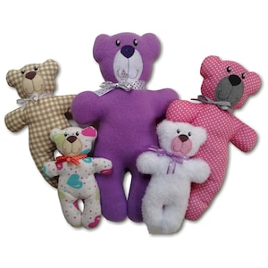 May include: A collection of five plush teddy bears in various patterns and colors. One is beige gingham, one is purple fleece, one is pink with white polka dots, one is white with colorful hearts, and one is solid white, each with a ribbon bow.