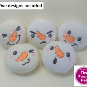 May include: Five white plush snowman ornaments with different embroidered facial expressions. The snowman faces include a smiling face, a frowning face, a surprised face, a winking face, and a grumpy face.