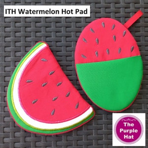 May include: Two fabric hot pads shaped like watermelon slices. One is a triangular wedge with red, white, and green layers and black seeds. The other is a rounded oval with a red top featuring black seeds and a green bottom. Text reads ITH Watermelon Hot Pad.