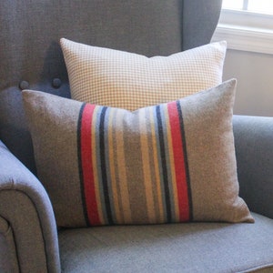 Yakima Camp Stripe Merino Wool Pillow Cover in Mineral Umber by True Having • Shown in 14"x20" size with our Tan Houndstooth Pillow Cover