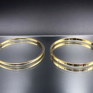 Vintage MONET Goldtone Bangles Set Firmado