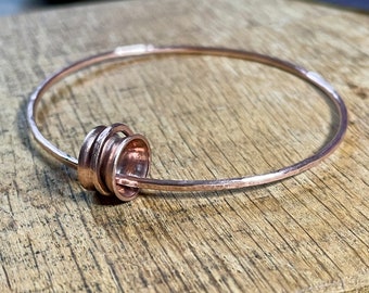 copper spinner bangle. Double bangle large pipe spinner. Recycled copper. Copper pipe spin bangle. Anxiety aid. 7.5cm diameter