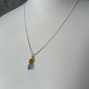 seabead silver necklace. Choose red single. yellow blue double. seaglass necklace. spinner image 5