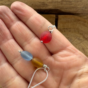 seabead silver necklace. Choose red single. yellow blue double. seaglass necklace. spinner image 7