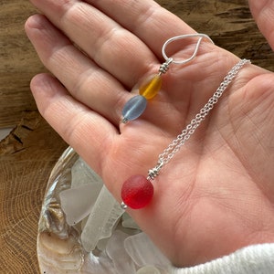 seabead silver necklace. Choose red single. yellow blue double. seaglass necklace. spinner image 1