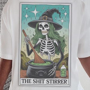 Witch Skeleton Graphic Shirt, Double-Sided Halloween Tee, Quirky Cauldron Design Top, Trendy Spooky Aesthetic Shirt, Tarot Card Tee