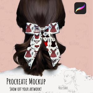 May include: A white hair bow with a red and white pattern of lingerie and other clothing. The bow is tied in a person's hair.