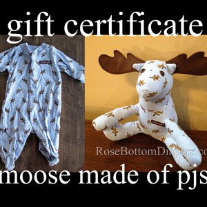 May include: A light blue baby onesie with a brown moose pattern next to a stuffed moose toy. The moose toy is made from fabric with the same pattern. Text at the top says "gift certificate" and at the bottom "moose made of pjs".