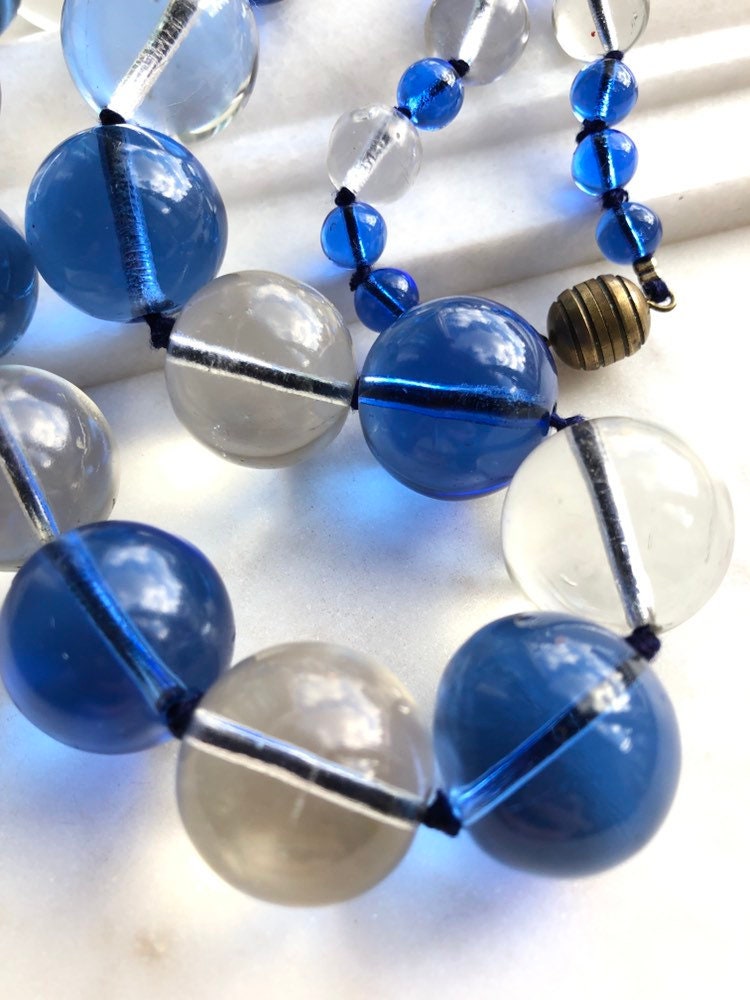 Blue Round Glass Beads and Ornate Silver and Blue Beaded Necklace.
