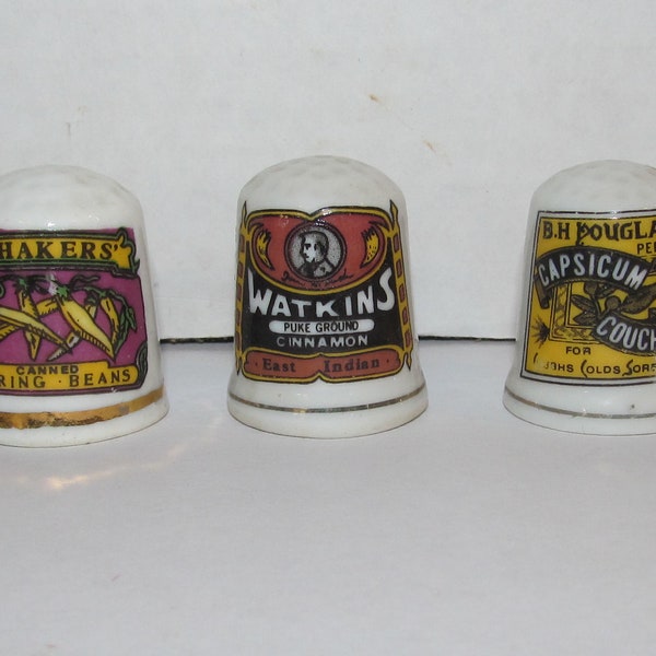 3 Vintage Porcelain Thimbles - Advertising - Watkins Cinnamon - Shakers Canned String Beans - Capsicum Cough drops