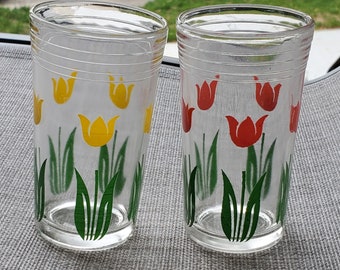 White and Green Daisy pattern Swanky Swigs Juice Cups with a Red 3 12 tall.