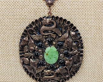 Vintage Art Deco Chinoiserie Dragon Serpent Garden Oval Brass Metal Medallion Pendant Etched Jadeite Jade ? Black Stone Jewelry Necklace