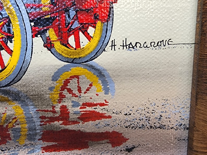 May include: A vintage-style painting of a red and yellow tractor with a blue and white shadow. The painting is signed "H. Hanrahan" in the bottom right corner.