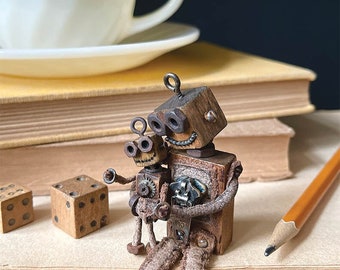 Włóż robota i małego robota do kieszeni siedzących w studiu. Zdjęcia z kartek autorstwa Robin Davis Studio