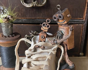 Karta rodziny robotów Steampunk: pocztówka retro z grafiką robota