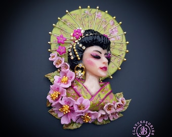 Geisha in sakura brooch
