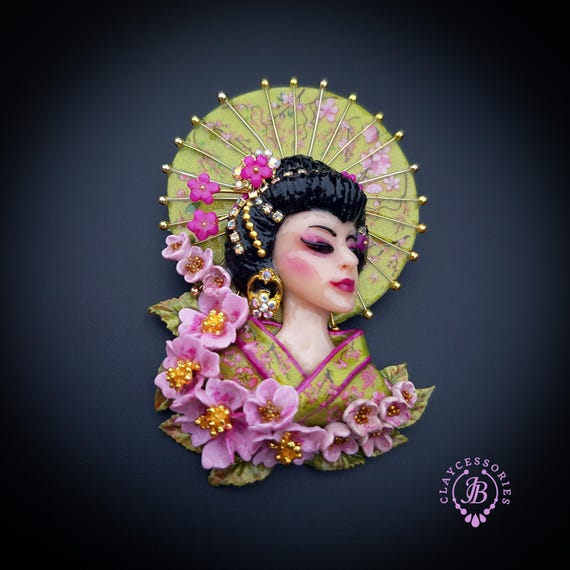 Geisha in sakura brooch