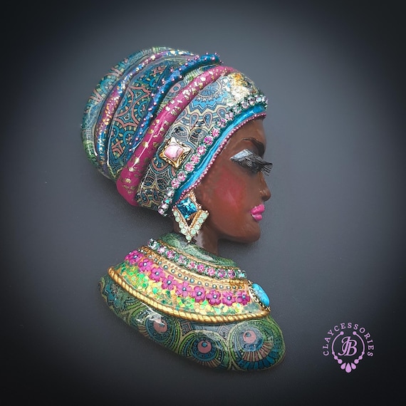 African woman brooch