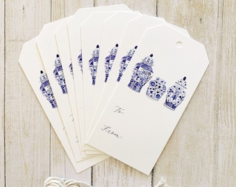 May include: A set of eight white gift tags with a blue and white illustration of Chinese ginger jars. The tags have a hole punched in the top corner and the text "To:" and "From:" printed on the bottom. A length of white twine is included.