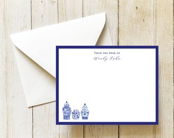 May include: A white card with a blue border and a blue and white illustration of three Chinese ginger jars. The text "From the Desk of Wendy Koba" is printed in black at the top of the card.