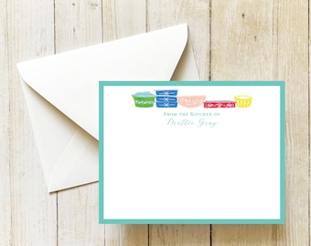 May include: A turquoise blue card with a white border and a row of five colorful vintage bowls with a white background. The text "From the Kitchen of Mollie Gray" is printed in black cursive font.