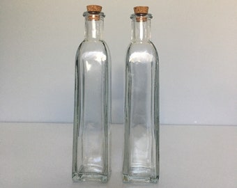 A Pair Of Vintage Glass Bottles