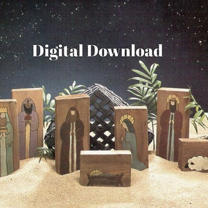 May include: A set of wooden nativity figures, painted in a folk art style. The figures include Mary, Joseph, the baby Jesus, and three wise men. The figures are arranged on a sandy surface with a palm tree in the background. The text "Digital Download" is displayed at the top of the image.