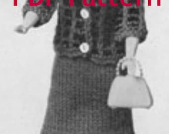 May include: A black and white photo of a doll wearing a black and white patterned sweater and skirt. The doll is holding a small purse. The text "PDF Pattern" is printed on the image.