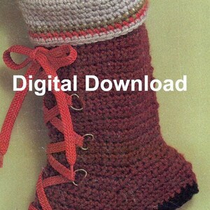 May include: A red crochet boot with a brown cuff and a red ribbon tied at the top. The boot has a lace-up front with gold eyelets. The text "Digital Download" is printed on the boot.