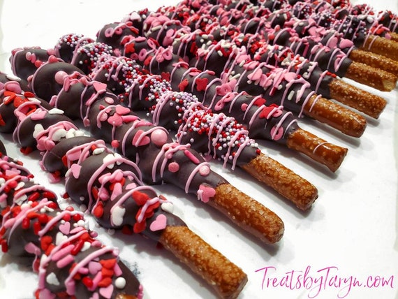 Valentine's Day chocolate covered caramel pretzels. Valentine's day treats. Valentine's day gift. Heart pretzels. Caramel pretzel. Valentine