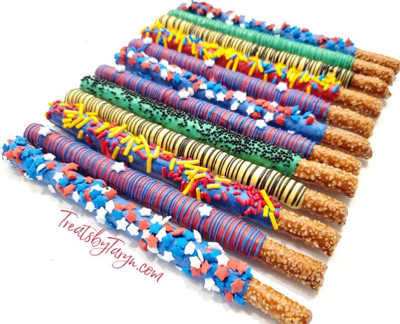 Superhero party chocolate covered Pretzels. Superhero pretzels. Superhero pretzels. Comic pretzel rods. Superhero party treats