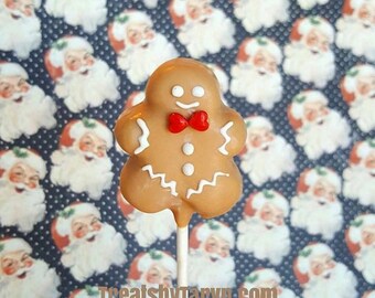 Gingerbread man cake pops. Stocking treats. Christmas treats. Christmas cake pop. Christmas party decor. Tree pop. Snow globe. Gingerbread