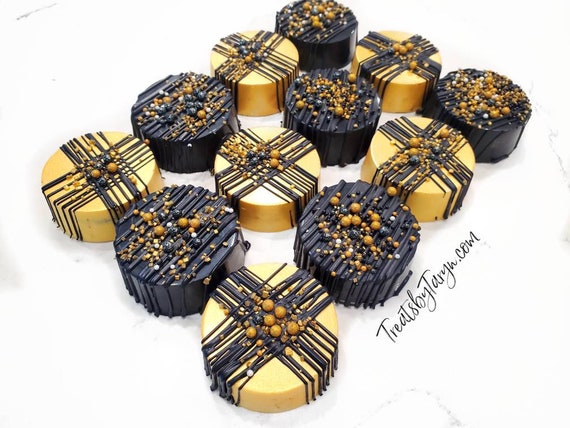 Black and gold oreos. New years favors. Gold treats. Chocolate covered oreos. Chocolate treats.