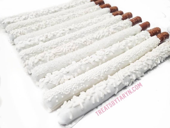 White chocolate covered pretzels. White pretzel rods.  White pretzels.  White Chocolate pretzels.  All White pretzels.  White party treats