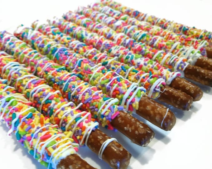 Rainbow Chocolate Covered Pretzels. rainbow chocolate dipped pretzels. rainbow pretzels. unicorn pretzels. rainbow party favors. pretzels