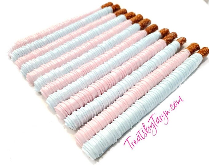 Chocolate Covered Pretzels. baby blue and white pretzels. Gender reveal pretzels. baby spritz pretzel rods. baby blue and pink rods