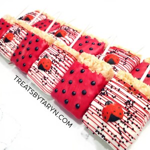 Chocolate Covered Oreos. Lady Bug Rice Krispy Treats. Pretzels. Baby