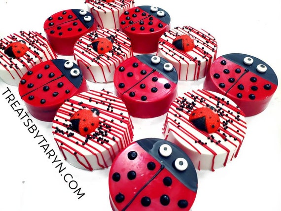 Chocolate Covered oreos. Lady bug oreos. pretzels. baby spritz oreos. Lady bug treats. Lady bug pretzels. Lady bug treat