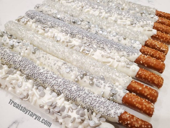 Chocolate Covered Pretzels. Silver pretzels. Silver and white pretzels. pretzel rods. Silver and white rods. Silver pretzels. Silver treat