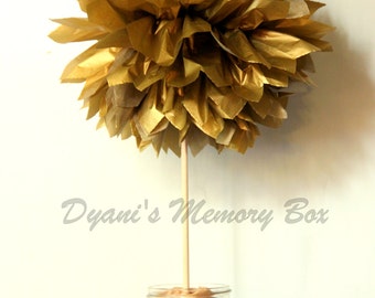Gold Tissue Pom Pom Centerpiece with Wooden Dowel