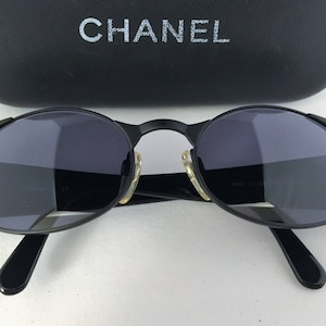 Chanel black oval sunglasses, circa 1995, adjustable nose pads Chanel Black Oval Sunglasses, Circa 1995, Adjustable Nose  main image 4