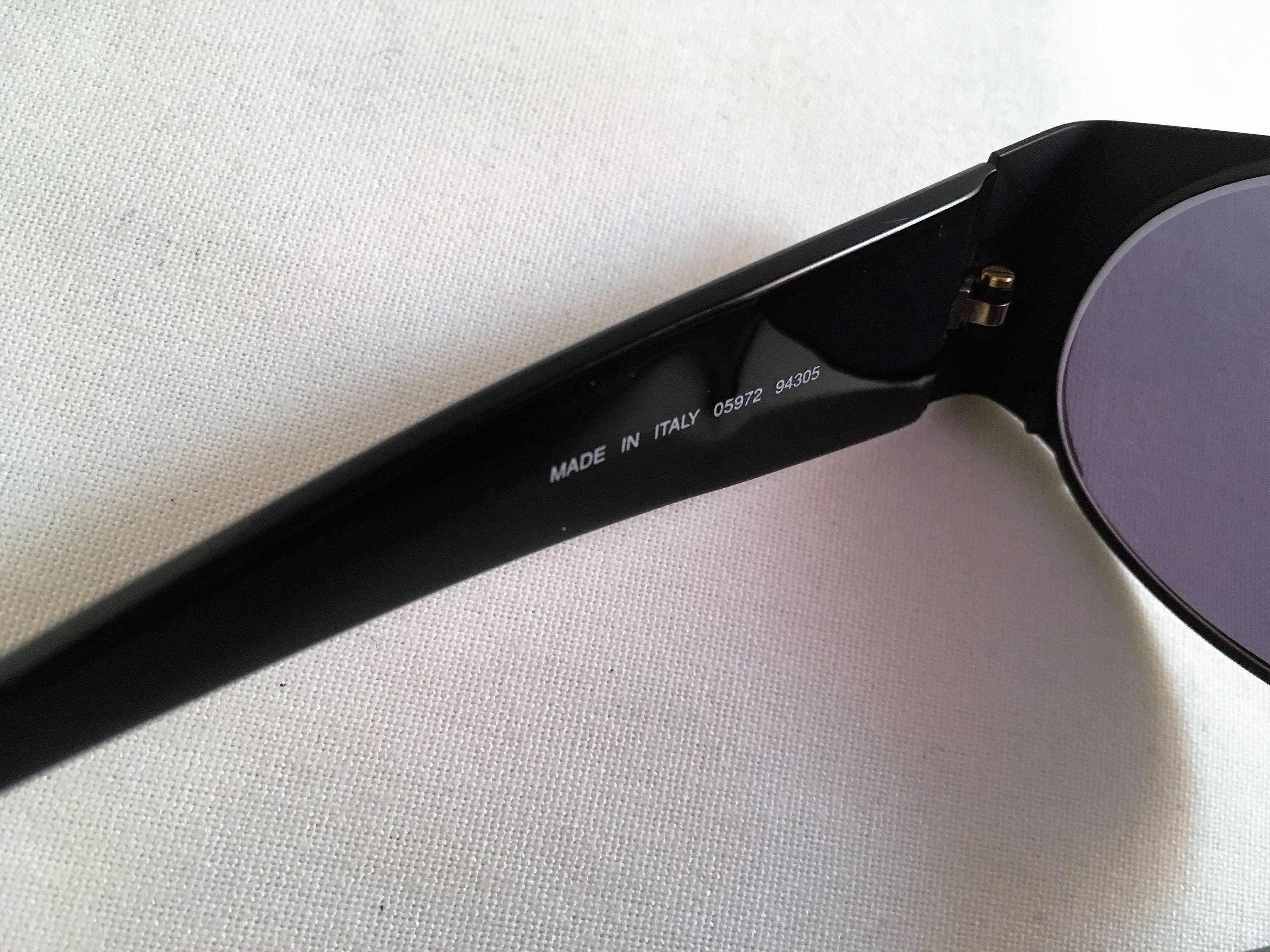 Chanel black oval sunglasses, circa 1995, adjustable nose pads Vintage Black Oval Chanel Sunglasses – by nothing new main image 3