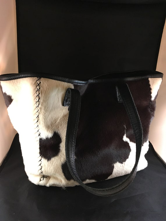 BCBG Max Azria vintage cow print black & white tot