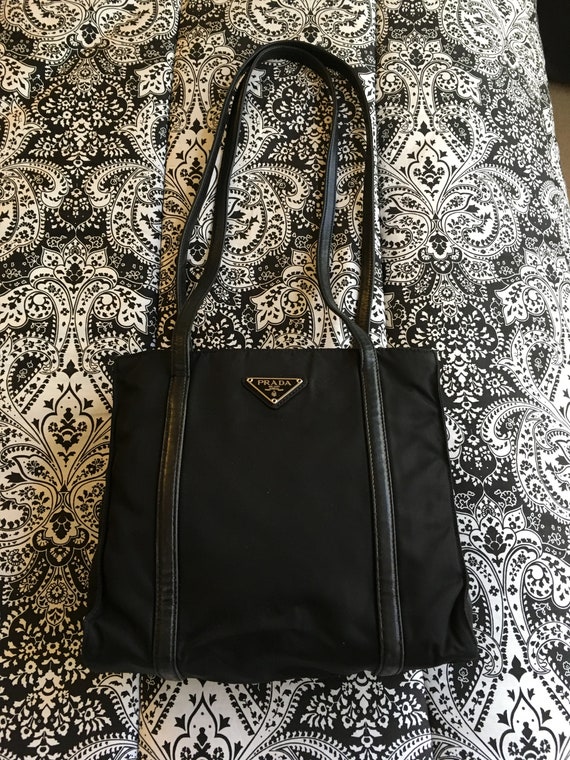 Prada, vintage Vela nylon black tote with leather str… - Gem