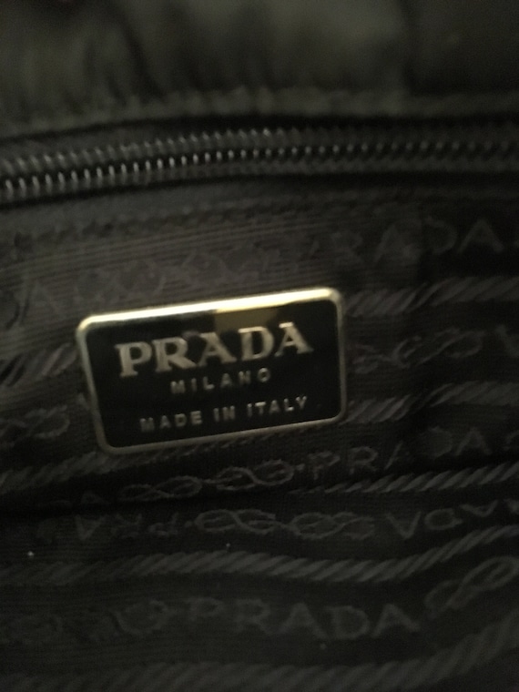 Vintage 1990s Prada nylon travel bag in black – We love Vintage