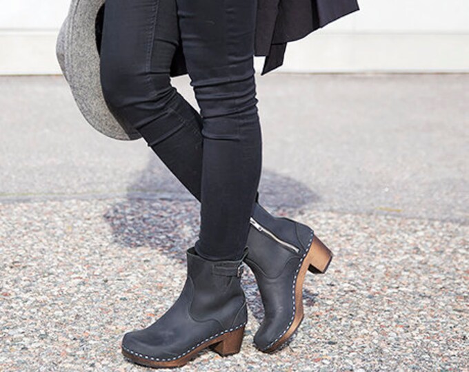 leather boots with wooden heel